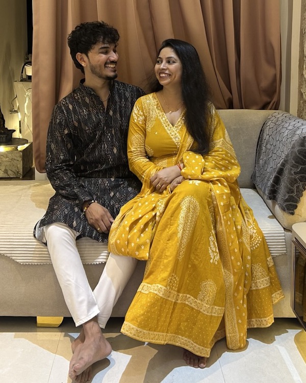 The two of us sitting together in traditional outfits
